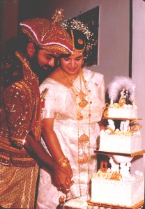 Cutting the cake at a Kandyan wedding